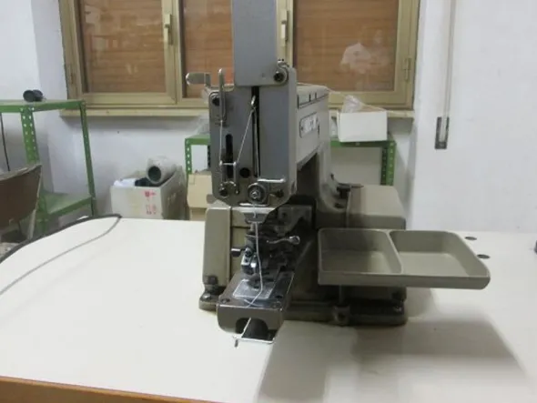 Attaccabottoni industriali