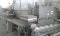 Centro di lavoro per la produzione di finestre in legno
