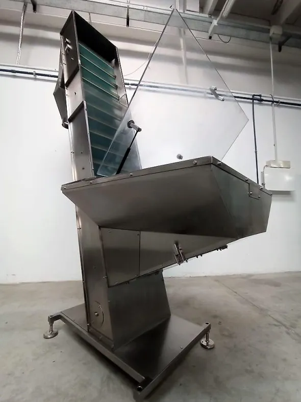 ELEVATORE A TRAMOGGIA PER TAPPI