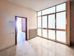 #23005 Fabbricato con unità direzionali, commerciali e residenziali