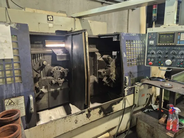 Hwacheon ECO-2SP3 · 1995 - Tornio CNC bimandrino usato