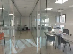 #18297 Immobile commerciale e quota di aree asfaltate