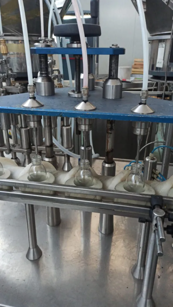 Linea riempimento profumo