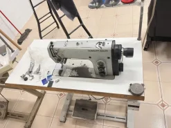 Macchina per cucire lineare rasafilo automatica