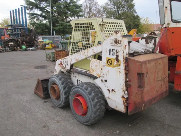 4#3595 Mini pala gommata Bobcat 853