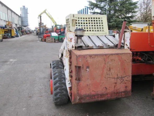 4#3595 Mini pala gommata Bobcat 853