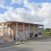#26137 Negozio con parcheggio e cantina in complesso commerciale