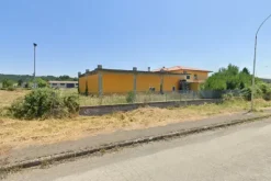 #24634 Opificio con abitazione e terreno con residua capacità edificatoria