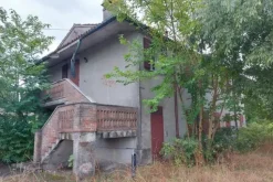#14440 Parco commerciale con locali grezzi e terreni