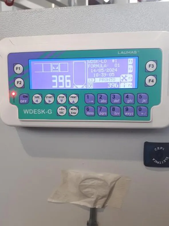 PLC CONTROLLED MIXING, BAG FILLING AND WEIGHING SYSTEM