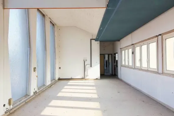 #22061 Porzione di edificio destinata a uffici