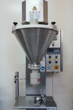 Riempitrice semiautomatica a peso per polveri e granuli