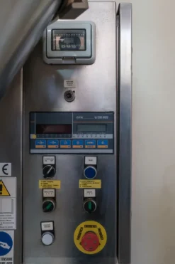 Riempitrice semiautomatica a peso per polveri e granuli