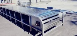 Tavolo trasportatore per suini