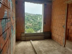 #14605 Terreno edificabile con edificio residenziale in costruzione