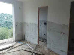 #14605 Terreno edificabile con edificio residenziale in costruzione
